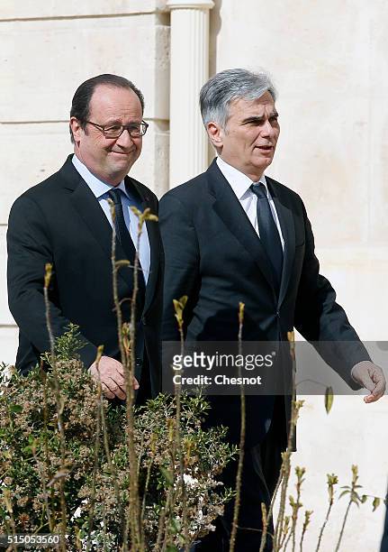 French President Francois Hollande speaks with Austrian Chancellor, Werner Faymann prior to a family photo at the Elysee Presidential Palace on March...