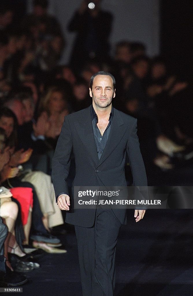 US designer Tom Ford acknowledges the audience aft