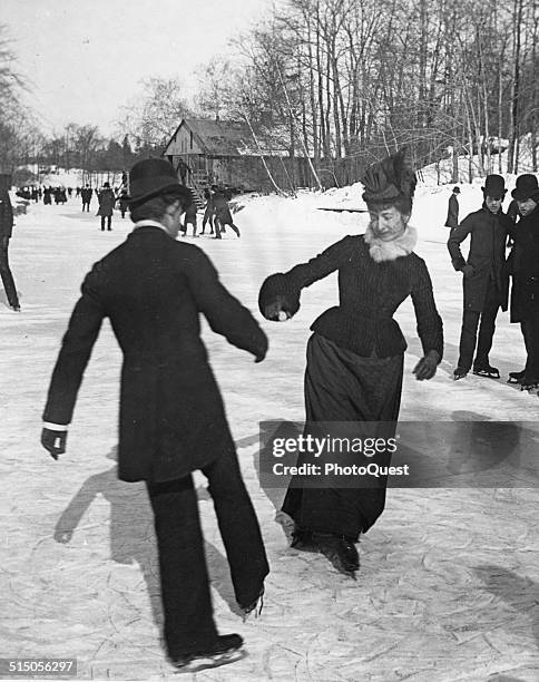 Couple ice skating in Central Park, New York, New York, circa 1880s.