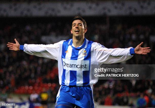 Deportivo La Coruna's Roy Makaay jubilates after he scored the third goal of his team during the PSG/Deportivo La Coruna second round Champions...