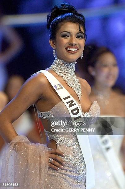 Year old Priyanka Chopra of India poses on stage during the Miss World final at the Millenium Dome in London, 30 November 2000. Chopra won the...