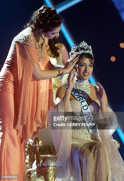 Year-old Priyanka Chopra of India is crowned by Miss World 1999, also from India Yukta Mookhey after winning the Miss World 2000 final at the...