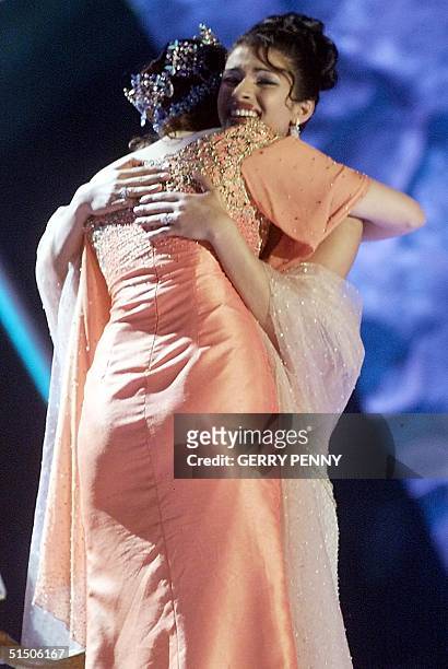 Year-old Priyanka Chopra of India is hugged by Miss World 1999, also from India Yukta Mookhey after winning the Miss World 2000 final at the...