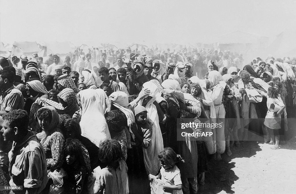 Palestinians line up in August 1967 in Wadi Dalail