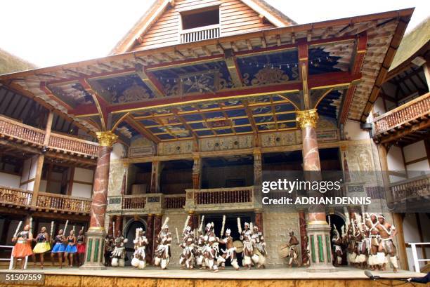 The cast of the Umabatha Company rehearse The Zulu Macbeth on the stage of Shakespeare's Globe Theatre in London 18 April 2001. The cast of the...