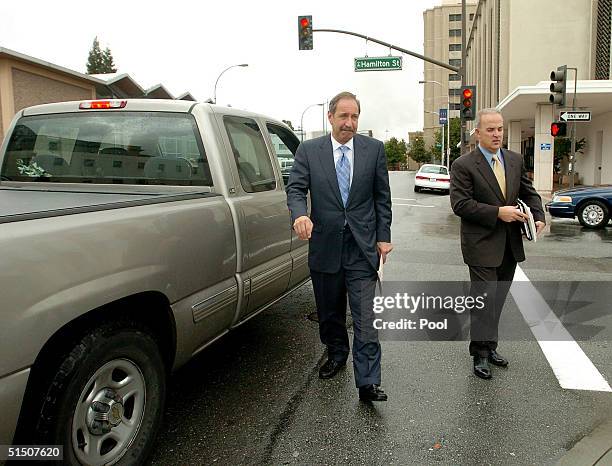 Defense attorney Mark Geragos and Pat Harris leave the San Mateo County Courthouse October 19, 2004 in Redwood City, California. Scott Peterson is on...