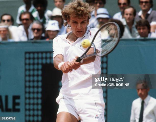 Swede's Mats Wilander hits a double backhand to Argentine Guillermo Vilas during the final of the French Tennis Open at the Roland Garros stadium in...