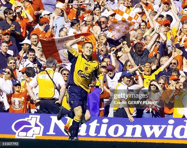 Liverpool striker Michael Owen celebrates after scoring his first goal against Arsenal during the FA Cup Final at The Millennium Stadium in Cardiff...