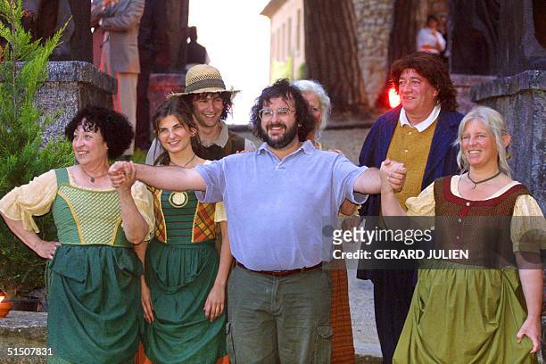 New-Zealand's director/writer/producer Peter Jackson poses at the hill-top Chateau Castellaras with actors for the party of the film "The Lord of the...