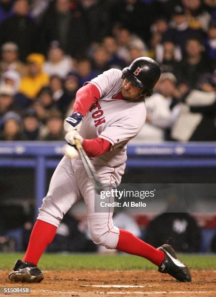 Mark Bellhorn of the Boston Red Sox hits a two-run-home-run in the fourth inning against the New York Yankees during game six of the American League...