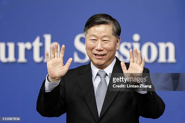 Shang Fulin, Chairman of China Banking Regulatory Commission attends the a press conference held for the National People's Congress at the media...