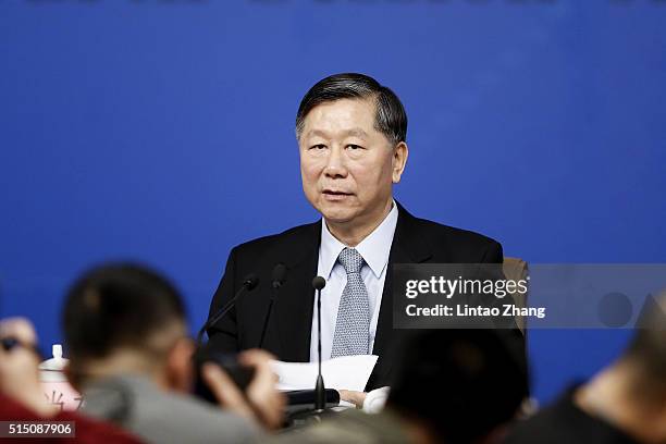 Shang Fulin, Chairman of China Banking Regulatory Commission attends the a press conference held for the National People's Congress at the media...