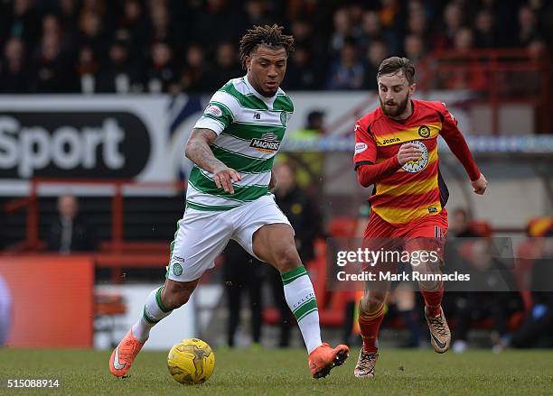 Colin Kazim-Richards of Celtic is tracked by Steven Lawless of Patrick Thistle during the Ladbrokes Scottish Premiership match between Patrick...