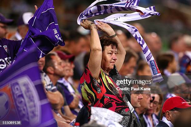 Glory fans celebrate a goal during the round 23 A-League match between the Perth Glory and the Central Coast Mariners at nib Stadium on March 12,...