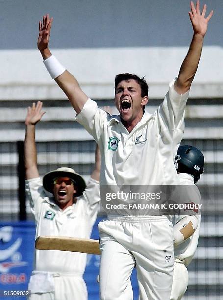 New Zealand cricketer James Franklin and captain Stephen Fleming appeal a Leg Before Wicket decision against Bangladeshi batsman Tapash Baysha during...