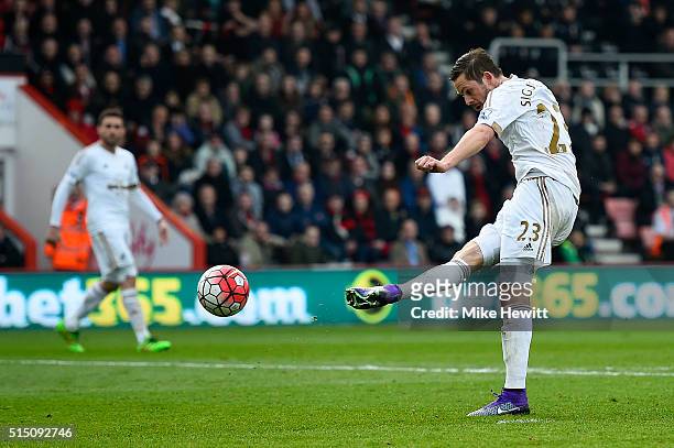 Gylfi Sigurdsson of Swansea City scores his team's second goal during the Barclays Premier League match between A.F.C. Bournemouth and Swansea City...