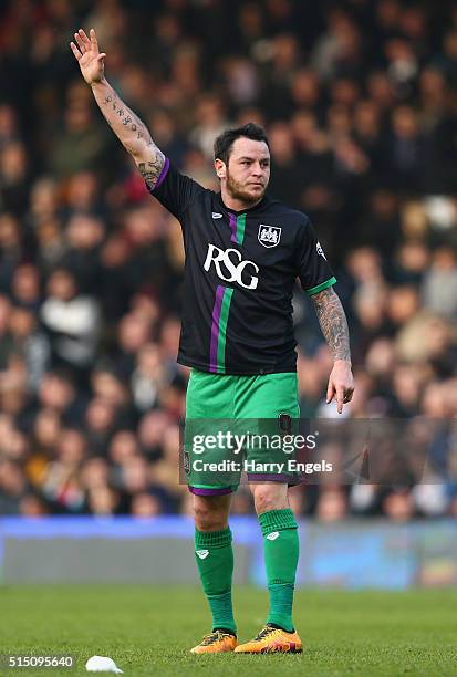 Lee Tomlin of Bristol City celebrates scoring the winning goal from a freekick during the Sky Bet Championship match between Fulham and Bristol City...