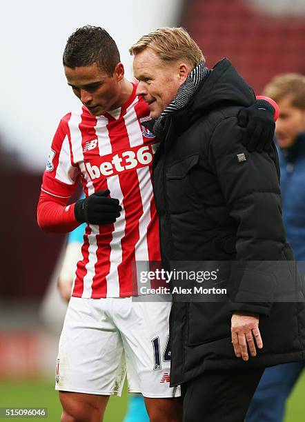 Ronald Koeman manager of Southampton talks with Ibrahim Afellay of Stoke City after the Barclays Premier League match between Stoke City and...