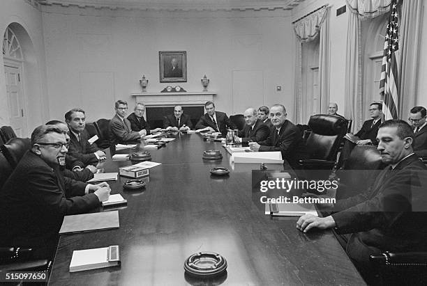 Cabinet Meeting. Washington, D.C.: Pres. Johnson meets with his cabinet. Clockwise they are: PMG, John Grounouski, USIA Director, Carl Rowan, Peace...