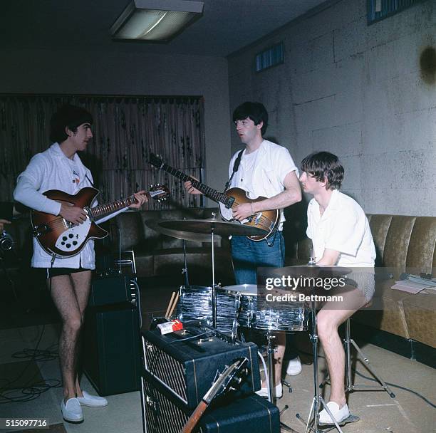 Miami Beach, Fla.: The Beatles, in their bathing suits, rehearse in the Deauville Hotel for their next appearance in the Sullivan TV show.