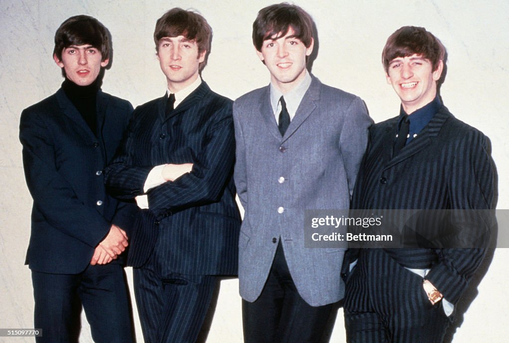 The Beatles Posing Together