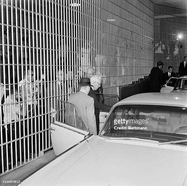 Chief Justice Earl Warren leaves Dallas County Jail after talking to Jack Ruby, the convicted killer of accused assassin Lee Harvey Oswald.