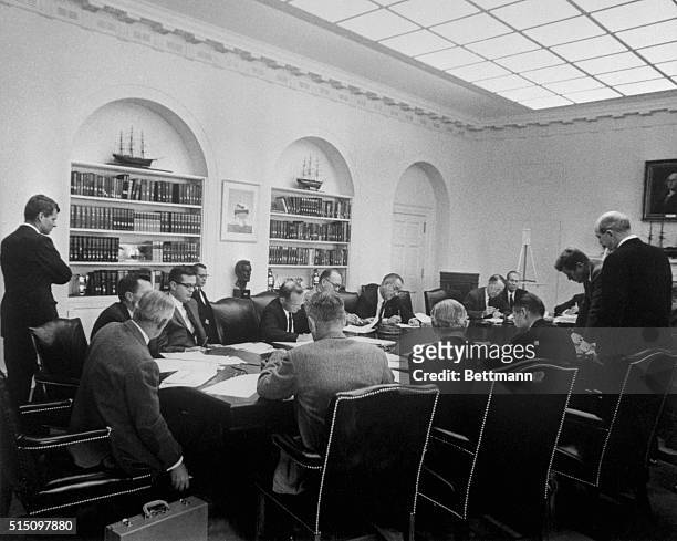 Washington, D.C.: In an historic meeting of President John Kennedy with his cabinet and advisors at the White House, this was the scene during the...