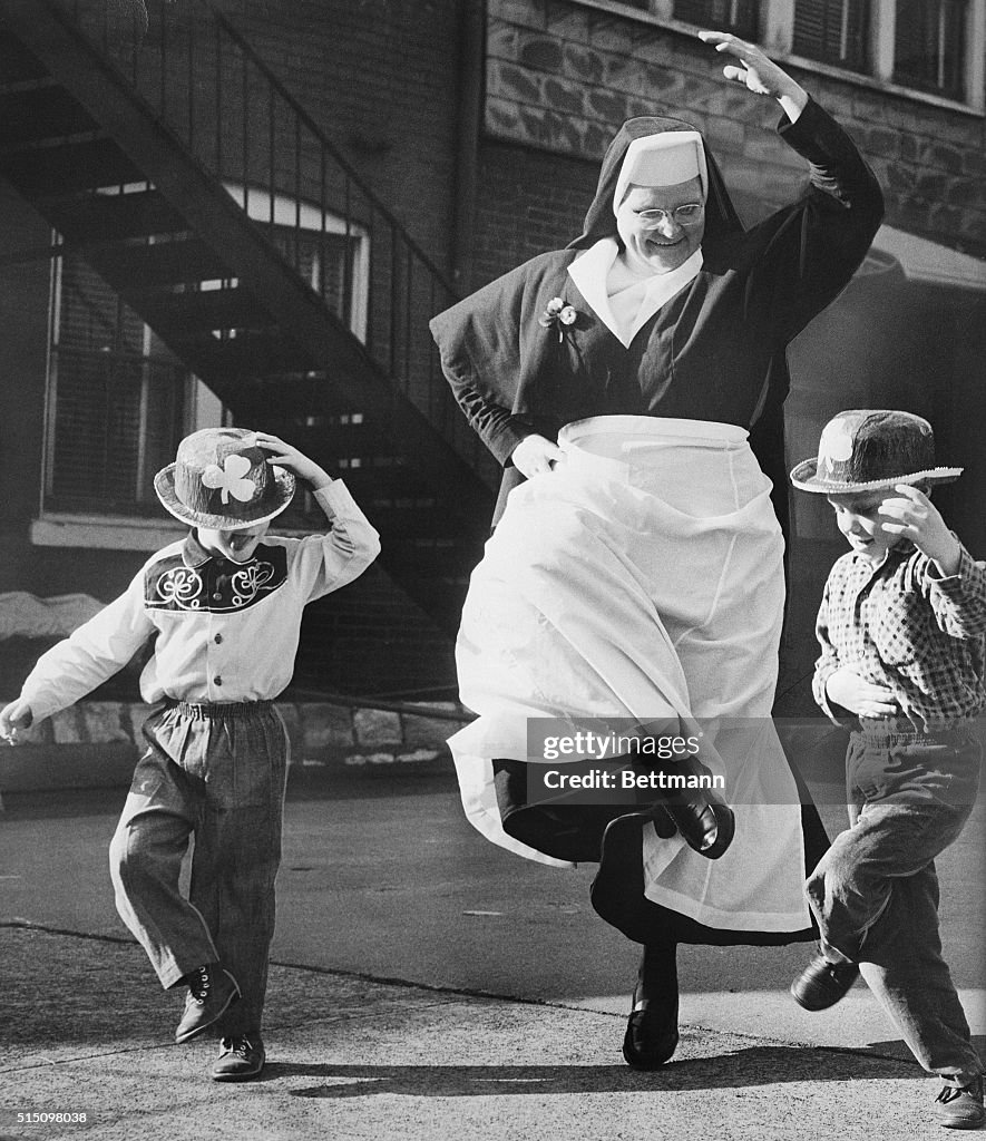 Nun Dancing with Children