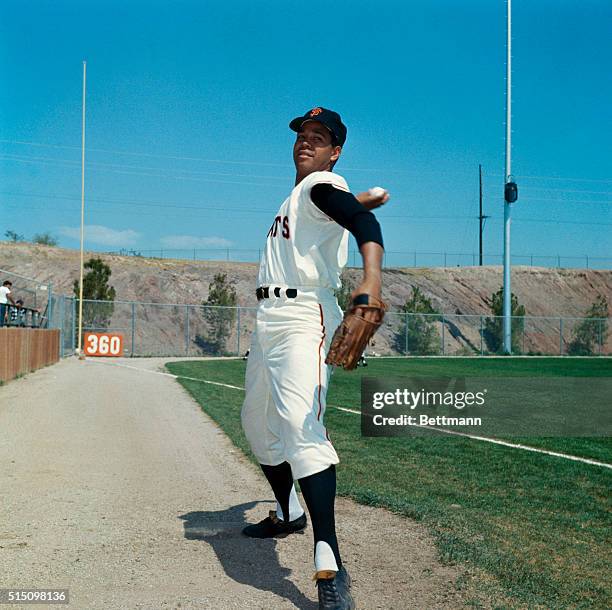 Juan Marichal, San Francisco Giants pitcher, practices during spring training at Phoenix Municipal Stadium.