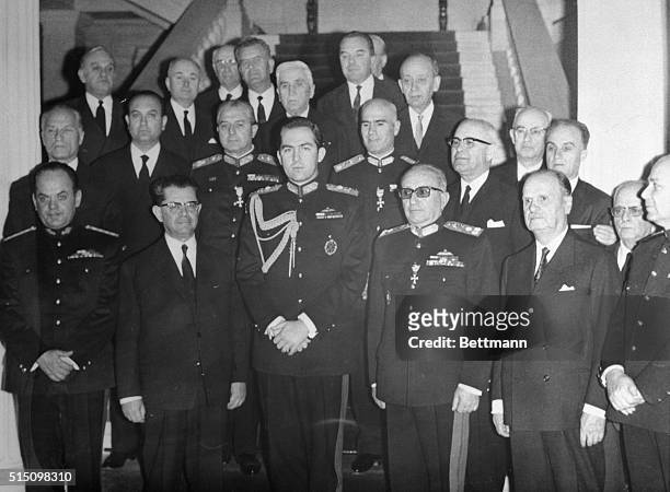 King Constantine of Greece, poses with new government officials on April 26th at the Athens Royal Palace here. From left are minister without...