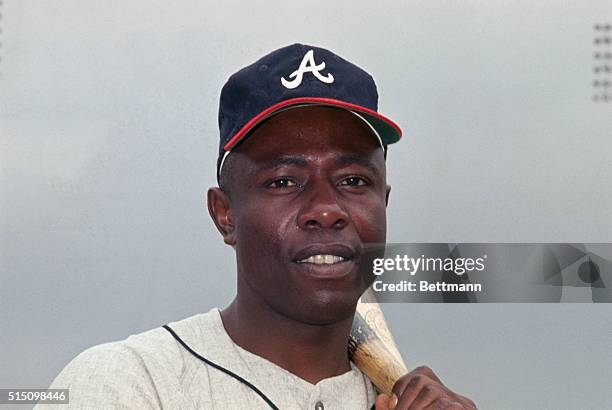 Hank Aaron is shown in this close up. He is shown as an Atlanta Braves outfielder during Spring Training.