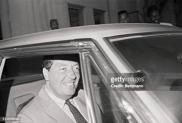 New Orleans, La.: New Orleans District Attorney Jim Garrison gives a big smile to reporters as he leaves the Criminal Courts Building here March 15...