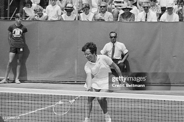 Billie Jean King of Long Beach, California, looks like she forgot to bring her tennis racket as she waits for a high shot from Kathleen Hard of Seal...