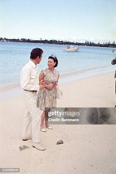Princess Margaret and Lord Snowdon on Bahamas beach.