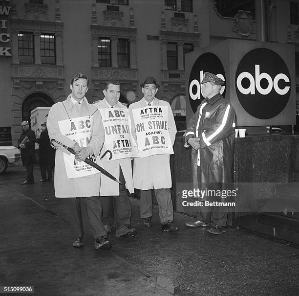 Petter Jennings, anchor man; Murphy Martin, network correspondent; Howard Cosell, sports commentator. All picket outside ABC on the Avenue of the...