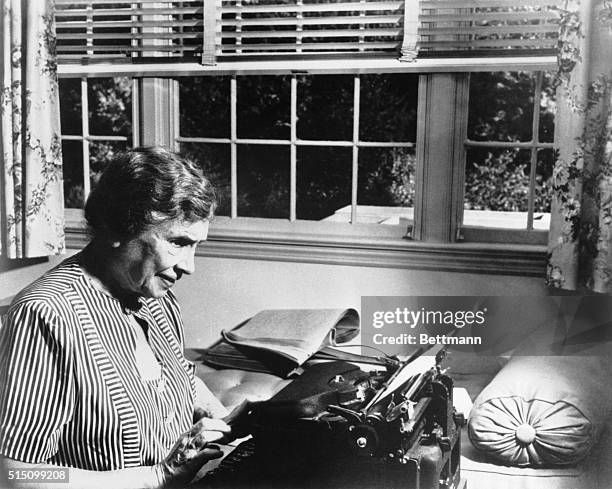 Literally thousands of letters, poems, awards citations came to Miss Keller every year. Above, she is shown at her comfortable home, Arcan Ridge, in...