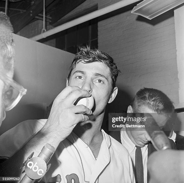 Red Sox - Twins. Boston, Massachusetts: Bosox star outfielder Carl Yastrzemski plants a big kiss on his 44th home run ball that scored three runs,...