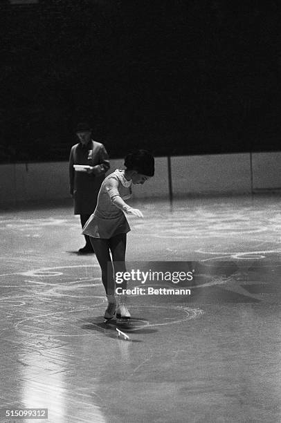 Photo shows Peggy Fleming of Colorado, Springs, Colorado, as she performs in the Compulsory School Figures, during the Senior Women competition of...