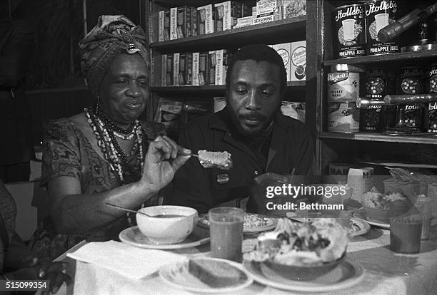 Negro comedian Dick Gregory ate his first meal of solid food in a Chicago health food store, since ending his 40-day fast in protest of the war in...