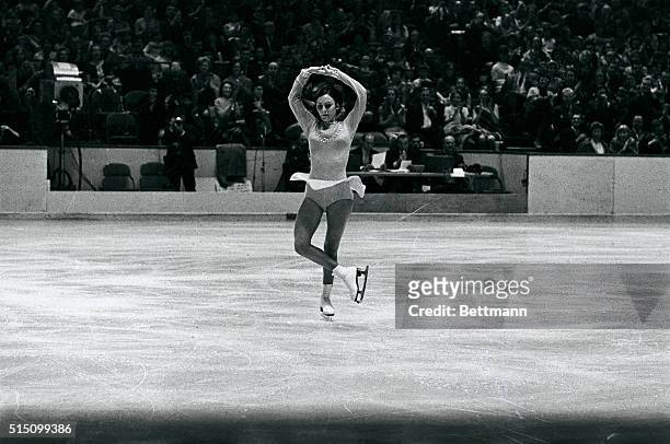 Perky Peggy Fleming of the Broadmoor Skating Club of Colorado Springs, Colo., shows her winning form in this photo combo as she executes her routine...