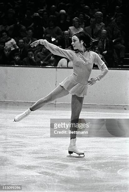 Perky Peggy Fleming of the Broadmoor Skating Club of Colorado Springs, Colorado, shows her winning form in this photo combo as she executes her...