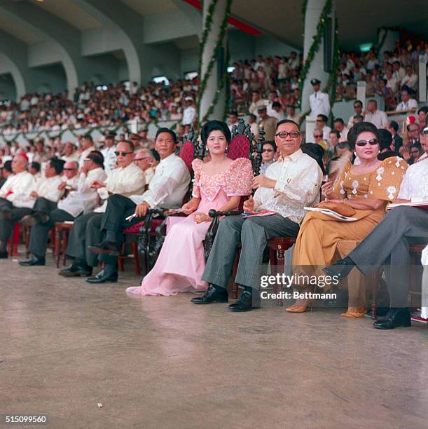 President of Philippines, Ferdinand Marcos, seated with wife and officials during inauguration ceremonies.