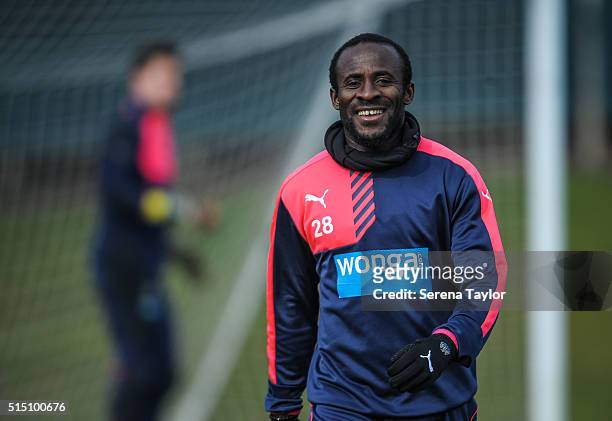 Seydou Doumbia smiles during the Newcastle United training session at The Newcastle United Training Centre on March 12 in Newcastle upon Tyne,...
