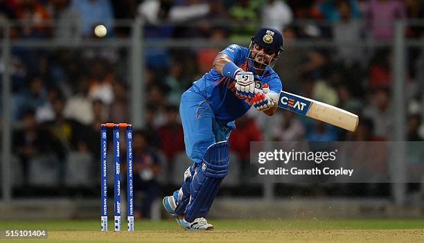 Suresh Raina of India bats during the ICC Twenty20 World Cup warm up match between India and South Africa at Wankhede Stadium on March 12, 2016 in...