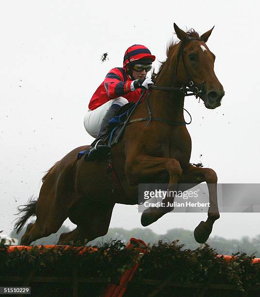 Jamie Moore and Kingston Town score an easy victory in The vcbet.co.uk Novices Hurdle Race run at Chepstow Racecourse on October 20, 2004 in...