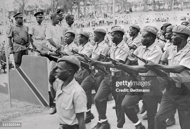 Communist trained Zanzibar soldiers march past the saluting base as Zanzibar celebrated the fourth anniversary of the Amalgamation of Zanzibar and...