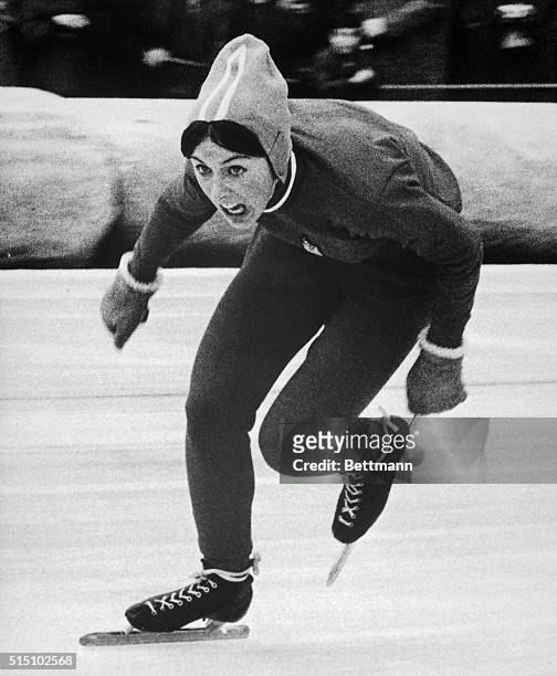 American Dianne Holum speed skates her way to a third place bronze medal in the ladies' 1,000-meter speed skating contest at the 1968 Olympic Winter...