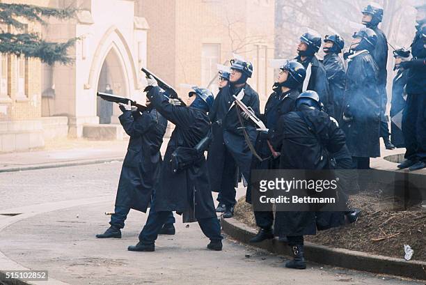 Police fire tear gas grenades at rooftops of Tokyo University, January 18th, during an 11-hour battle that dislodged the radical students who have...