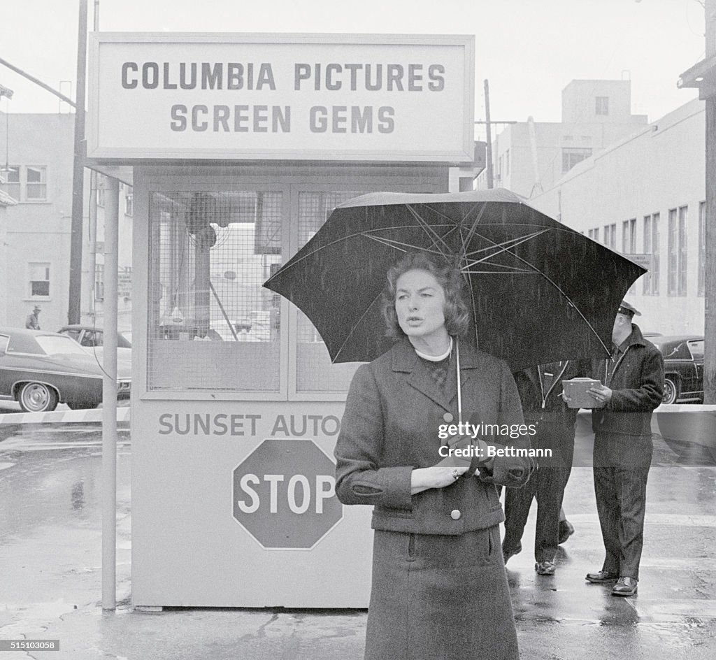 Ingrid Bergman Holding Umbrella in Rain
