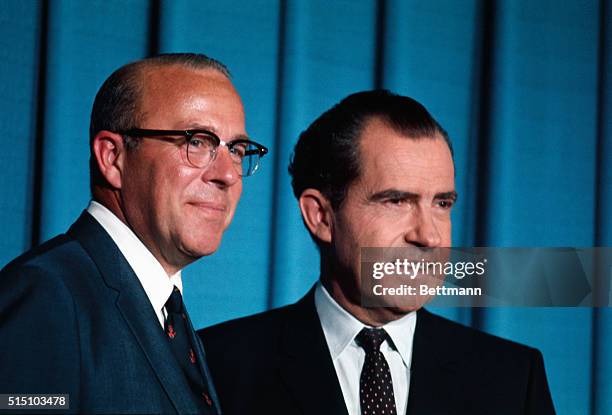 Washington, D.C.: Following television announcement, Pres.-elect Richard Nixon poses with George Shultz, who he named as his choice for Secretary of...